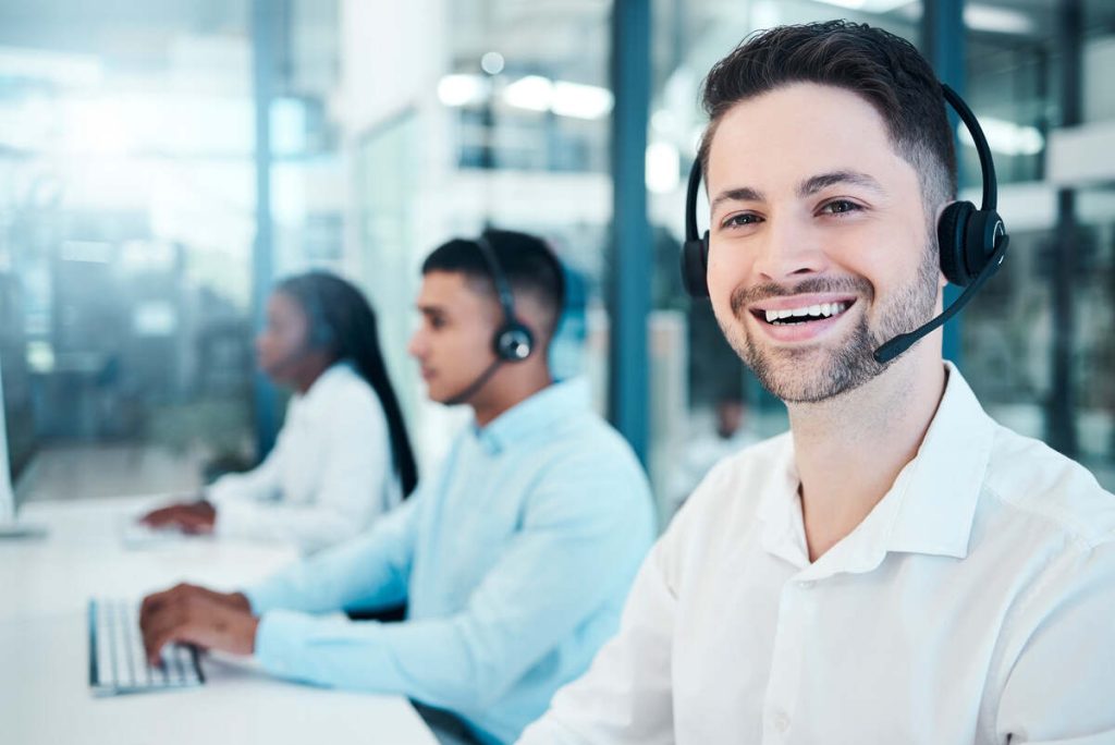 Call center, telemarketing, and customer service consultant wearing a headset and looking happy at .