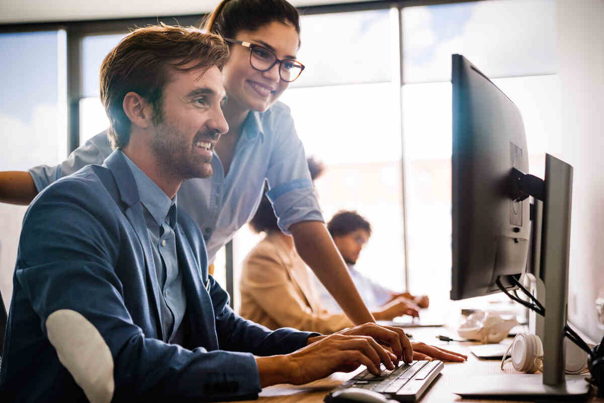 Portrait of successful business team working together in office