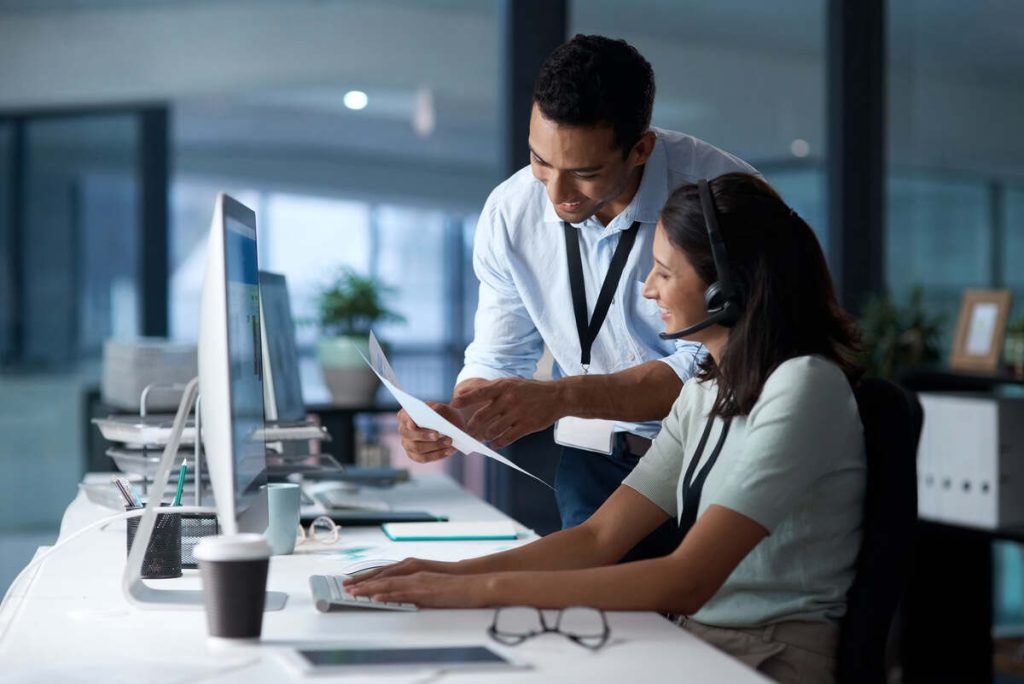 two people talking in the office