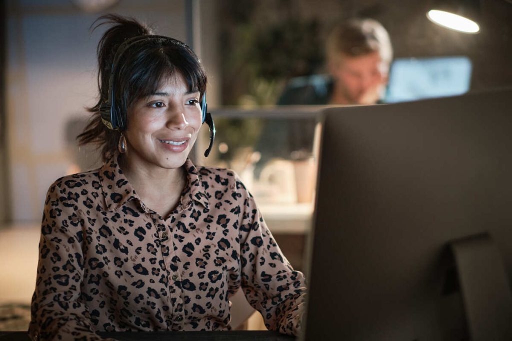 Businesswoman making online call at office